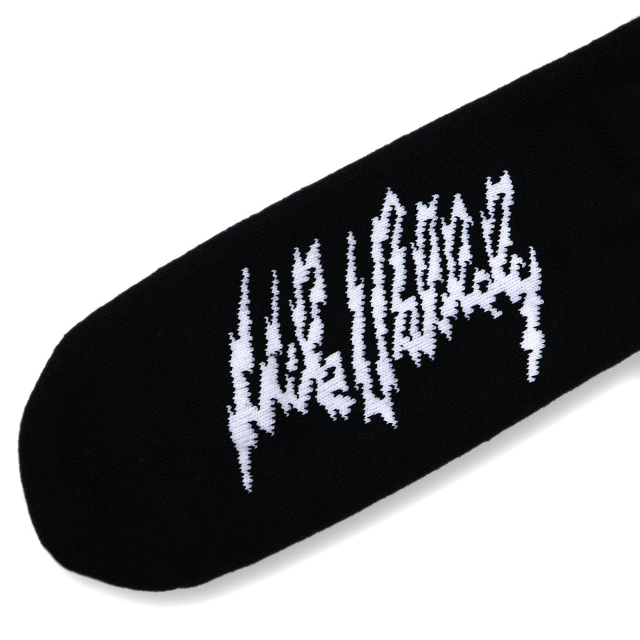 Mike Vallely Signature Sock in black with a white lightning bolt and two red stripes.