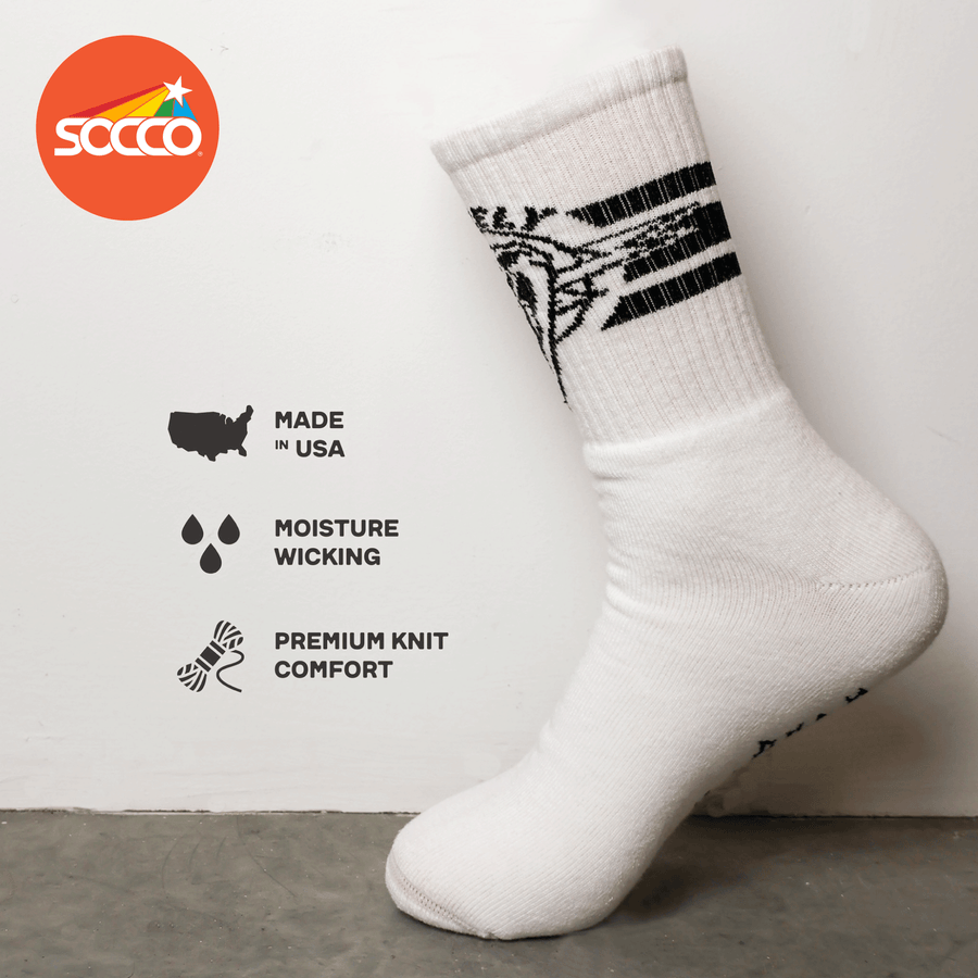 Dirty Donny x Mike Vallely Collaboration Crew Socks. White Crew Socks with 3 black stripes on the leg. Mike Vallely's Elephant V Logo with lightning bolts in an inverted triangle on the front of the leg. 