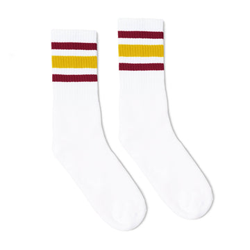 White athletic crew length socks with gold and maroon stripes for men, women and children.