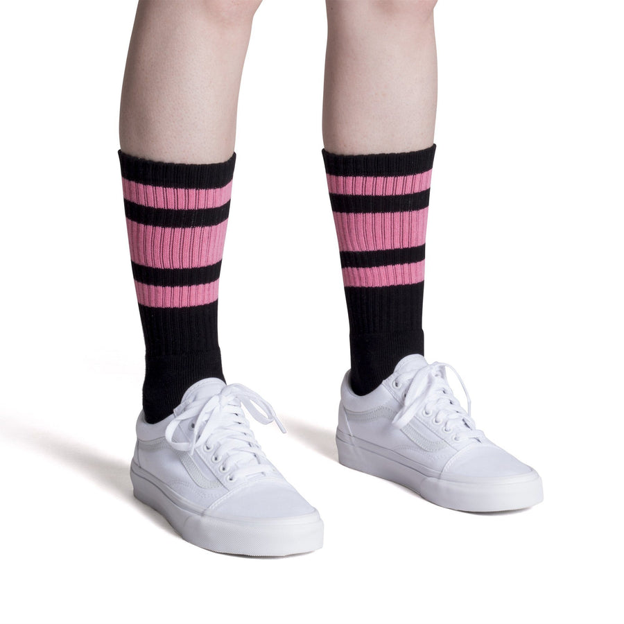 Black socks with three pink stripes for men, women and kids.