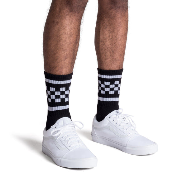 Black athletic socks with two white stripes and checkers in between. For men, women and kids.