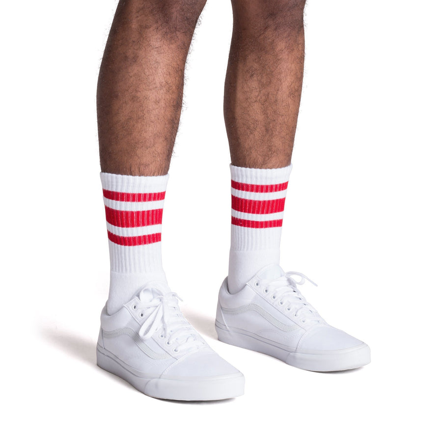 White athletic socks with three red stripes for men, women and kids.