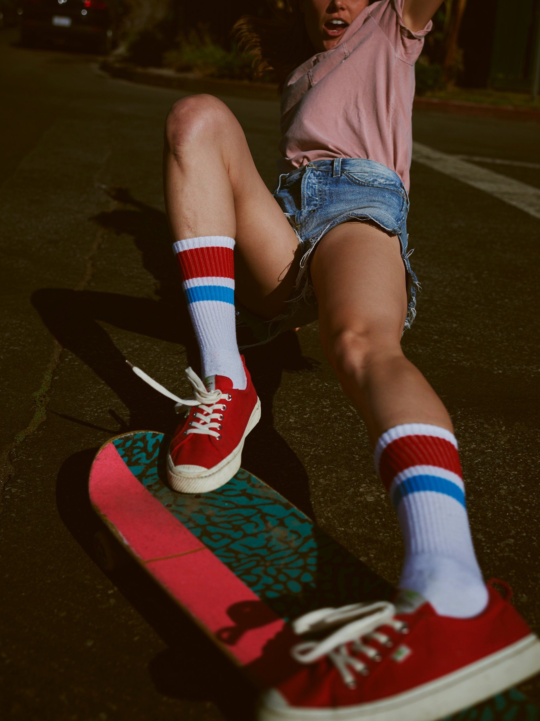 Sierra Prescott skateboarding in SOCCO socks. 