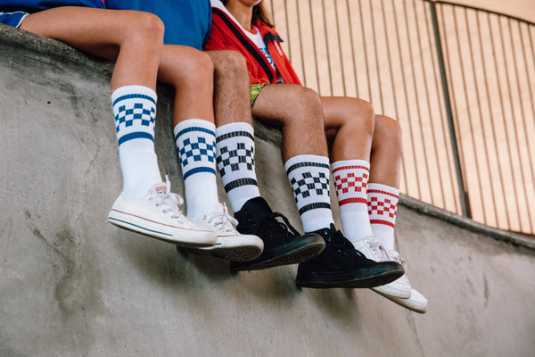 SOCCO checkered socks at the skatepark.