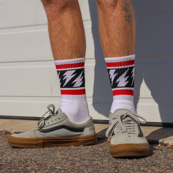 Mike Vallely Signature Sock in white with red stripes and lightning bolts.