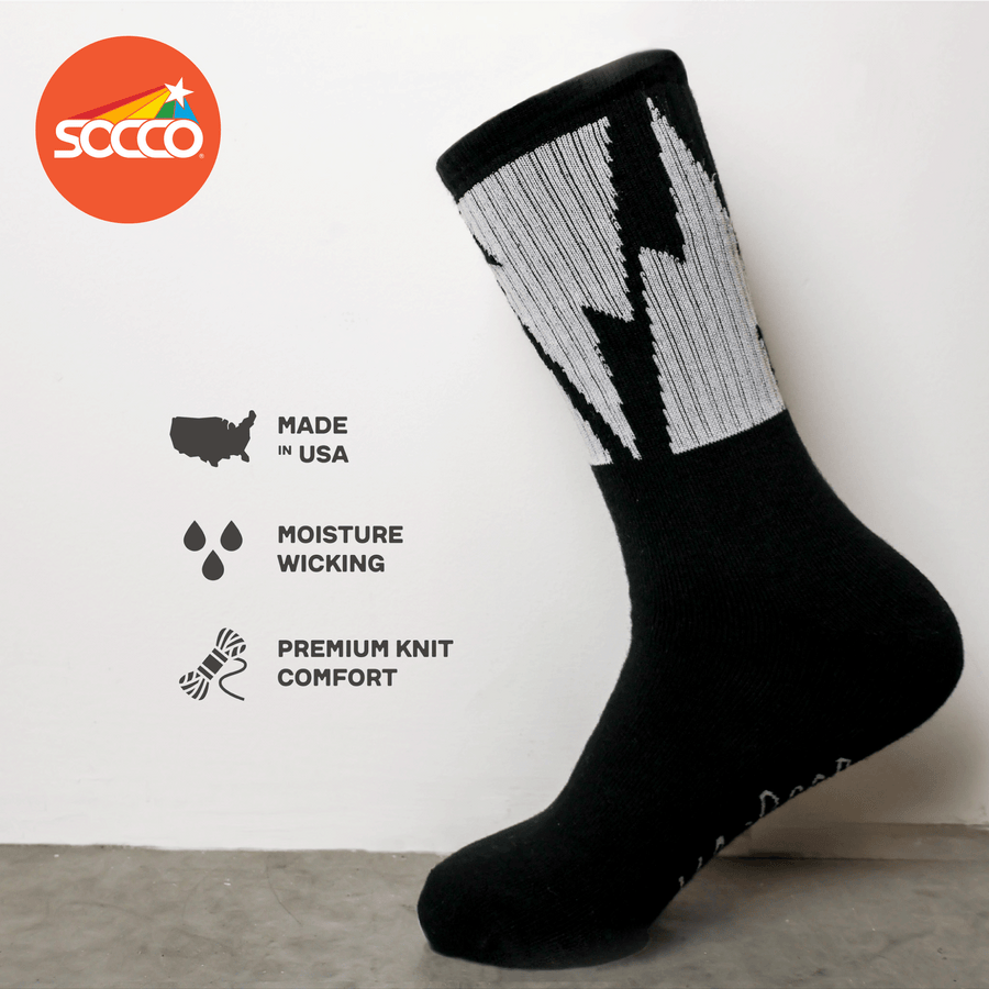 Black Crew socks with Large White Lightning Bolts decorating the leg all the way around. Mike Vallely's Signature knitted into the bottom of the foot.