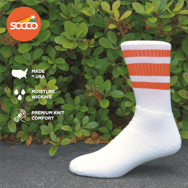 White athletic socks with three orange stripes for men, women and kids.