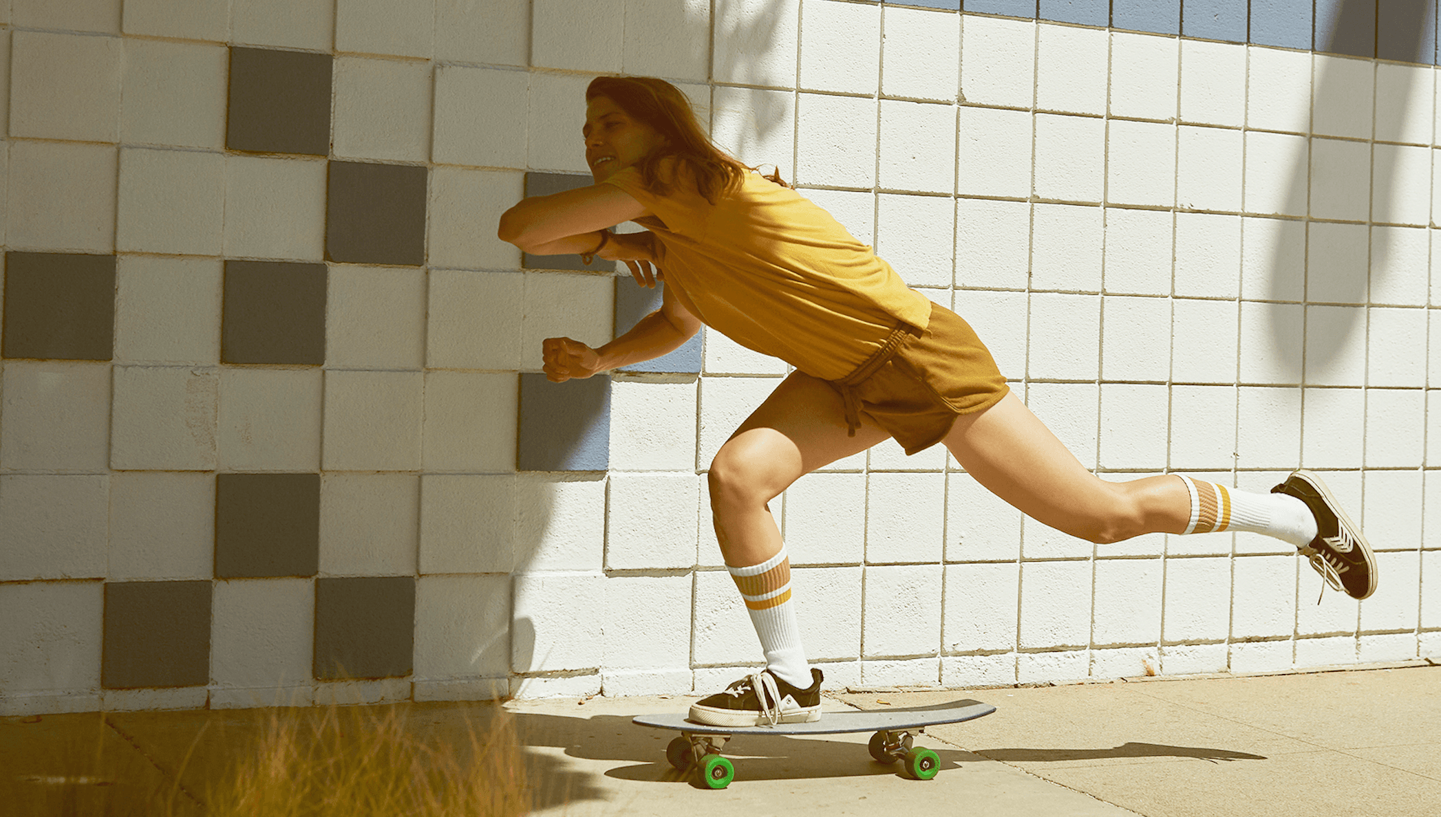 Sierra Prescott skateboarding in custom SOCCO socks.