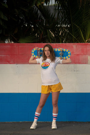 Female wearing red, white, and blue All American SOCCO socks