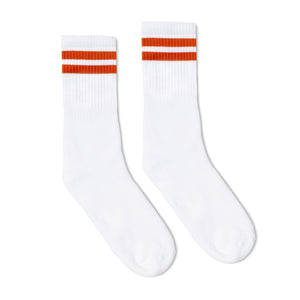 a pair of white socks with orange stripes