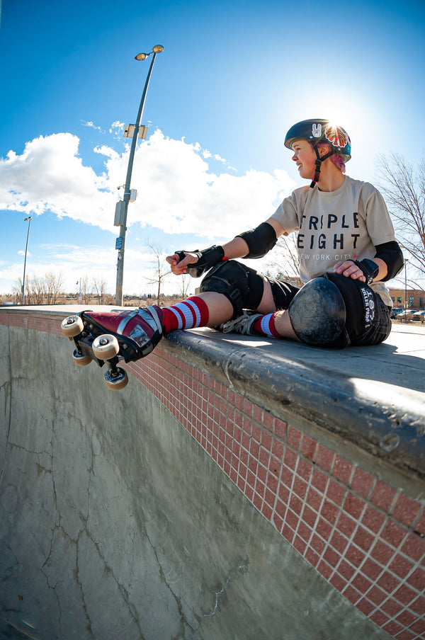 Red SOCCO socks with white stripes