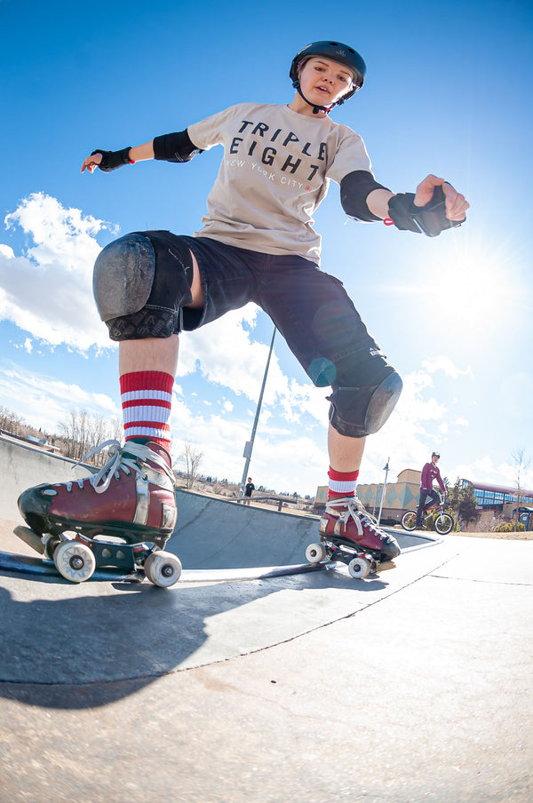 Red SOCCO socks with white stripes