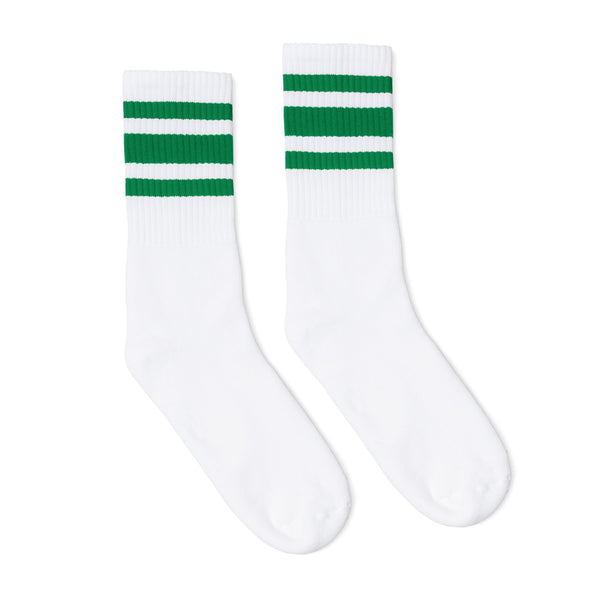 White athletic crew length socks with three green stripes for men, women and children.