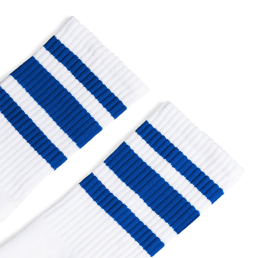 White athletic socks with three royal blue stripes for men, women and kids.