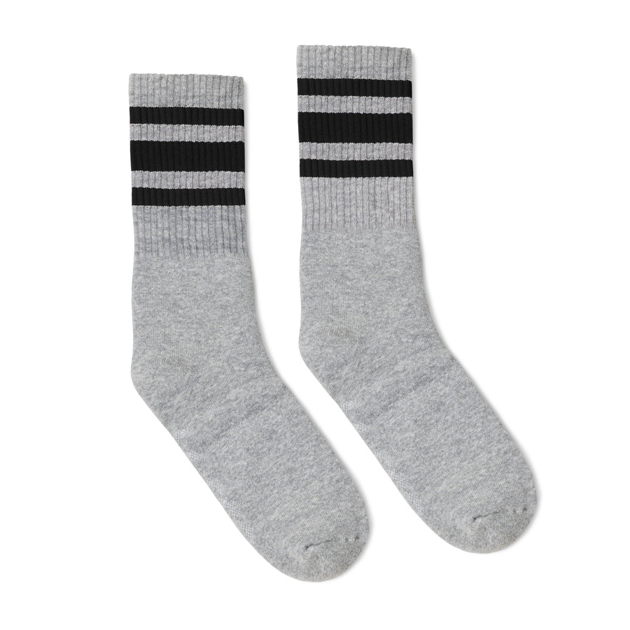 Grey athletic socks with black stripes for men, women and children.