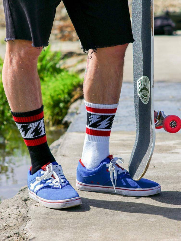 Mike Vallely Signature Sock in white with red stripes and lightning bolts.