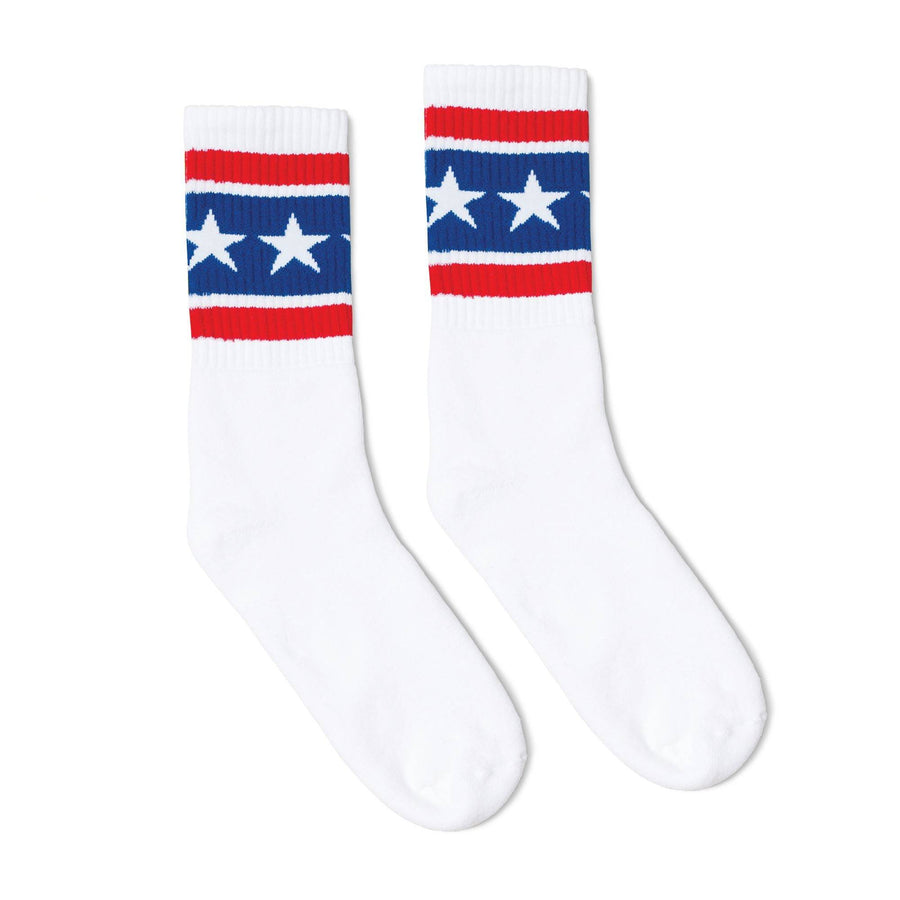 White athletic socks with two red stripes and white stars on a thick blue stripe for men, women and kids.