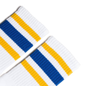 White athletic Crew Length socks with gold and blue stripes for men, women and children.
