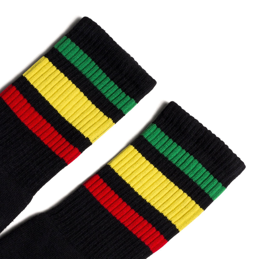 Black athletic socks with one red, green and yellow stripe for men, women and kids.