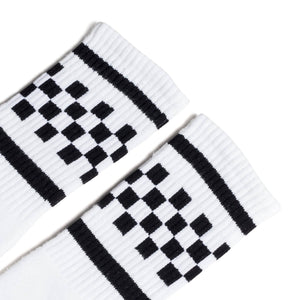 White athletic socks with two black stripes and checkers in between on the Leg. For men, women and kids. Crew Sock Length.