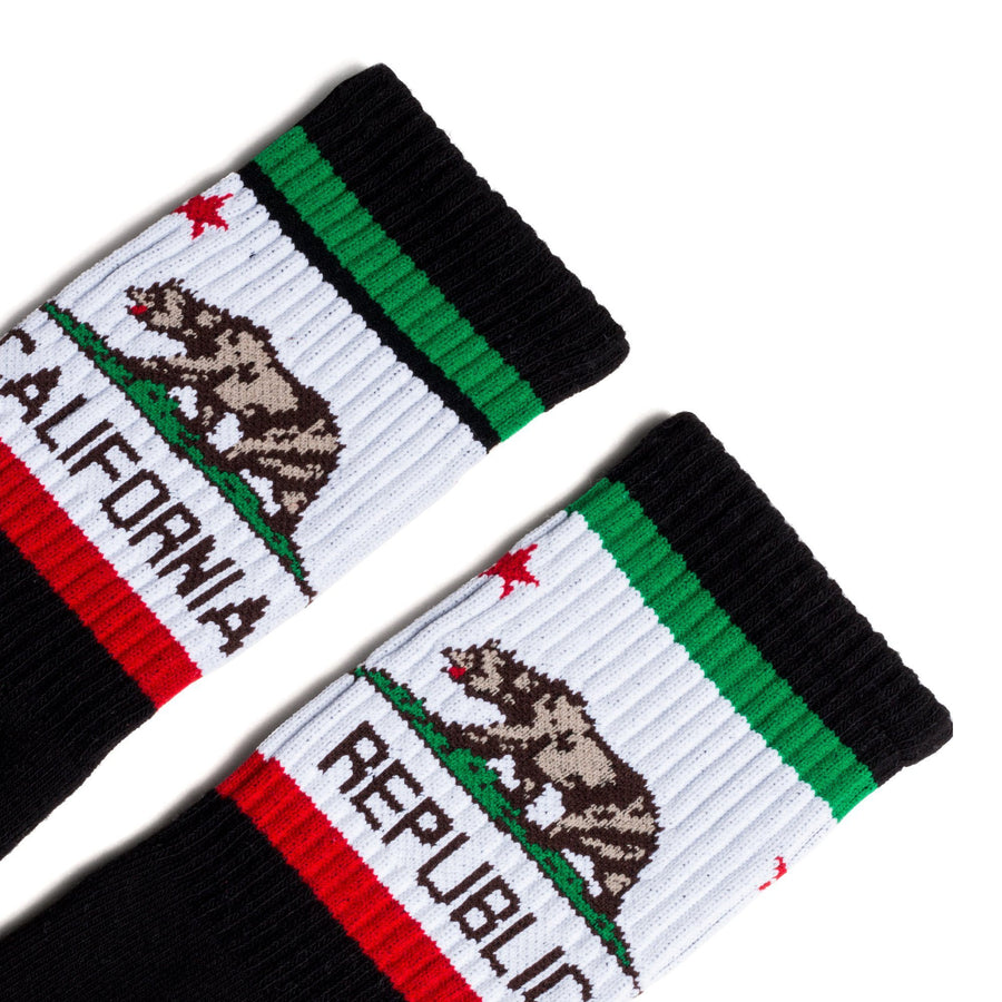 Black athletic socks with a California bear logo in white, brown, red and green. Crew socks for men, women and children.
