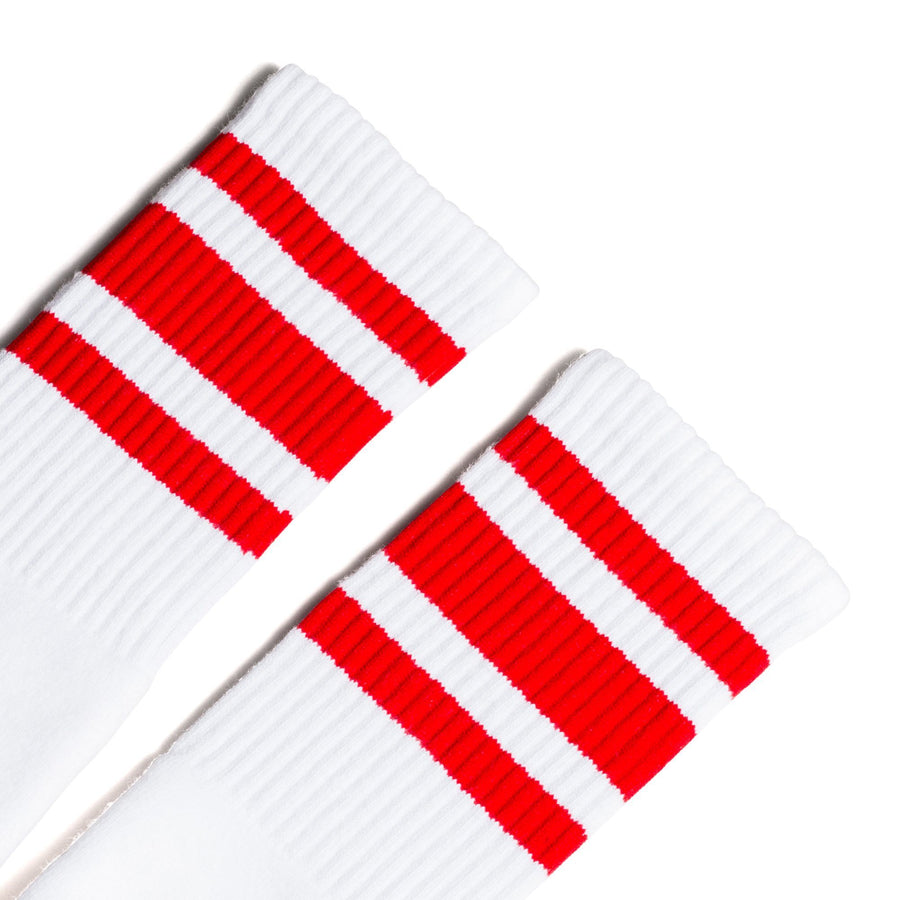 White athletic socks with three red stripes for men, women and kids.
