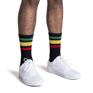 Black athletic socks with one red, green and yellow stripe for men, women and kids.