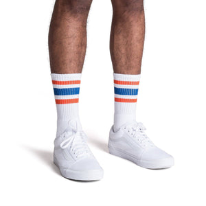 White athletic socks with orange and blue stripes for men, women and kids.