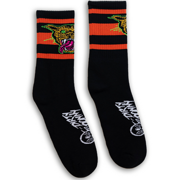 SOCCO x Dirty Donny Cougar Socks. Black Crew socks with three red stripes on the leg; on top of the stripes on the outside of the leg is a 70s style Cheetah head with it's mouth open, teeth bared, and tongue hanging out. The Cheetah is outlined in Acid Green. Dirty Donny Logo Signature on the top of the foot is in white.